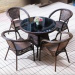 "5-piece Outdoor Dining Set with Plastic Seating, Flameproof, Round Black Table Top, Chair, Table, 35.4"L x 35.4"W x 29.1"H, Table & 4 Chairs"