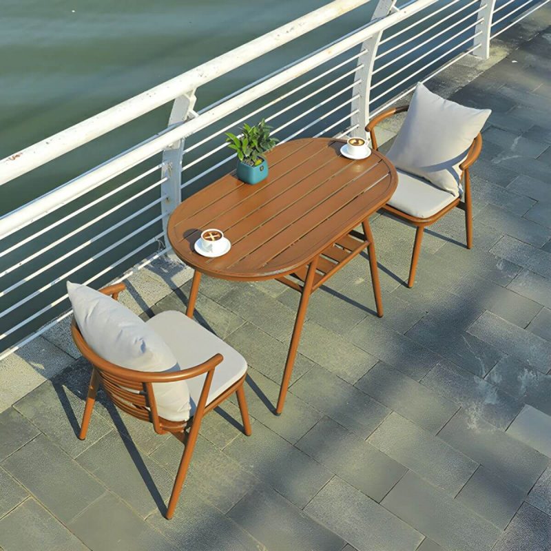 "Oval Metal Patio Table Contemporary Style Water Resistant in Brown - 43.3"L x 23.6"W x 29.5"H"