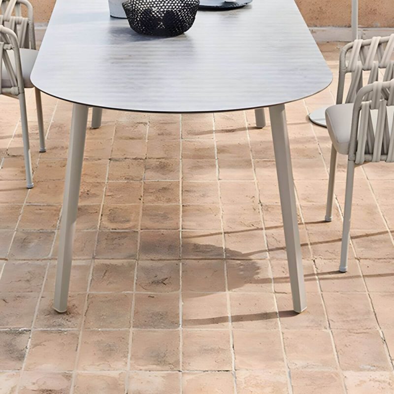 "Contemporary Style Stone Patio Table Oval Shape with Metal Legs in Grey/White - Table Only 63"L x 31.5"W x 29.5"H White"