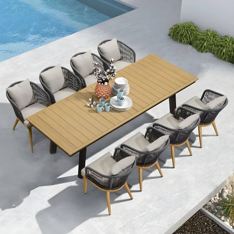 "Modern Black Patio Dining Set: Metal Frame, Upholstered White Cushions, Leaf Not Included - Table & 8 Chairs 102.4"L x 39.4"W x 29.5"H"