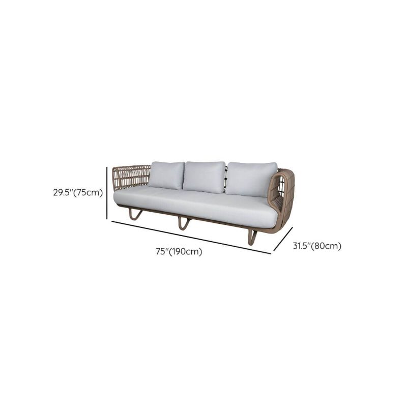 "Dimension of Tropical Rattan Accent Outdoor Patio Sofa with Slipcovered Cushion - 74.8"L x 31.5"W x 29.5"H Symmetrical"