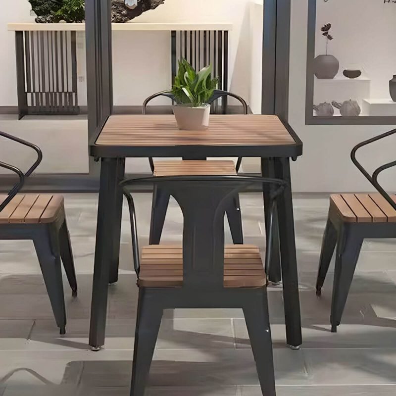 "Industrial Metal Outdoor Dining Table with Wood Top, Perfect for Patios and Outdoor Gatherings - Table Only Black 55.1"L x 27.6"W x 29.5"H"