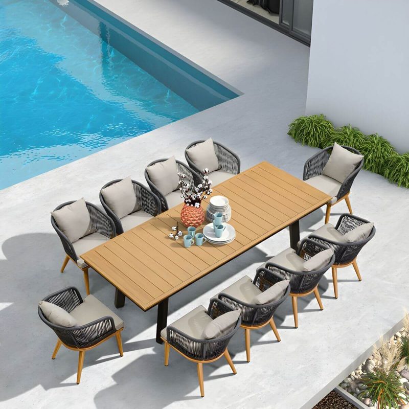 "Modern Black Patio Dining Set: Metal Frame, Upholstered White Cushions, Leaf Not Included - Table & 8 Chairs 102.4"L x 39.4"W x 29.5"H"