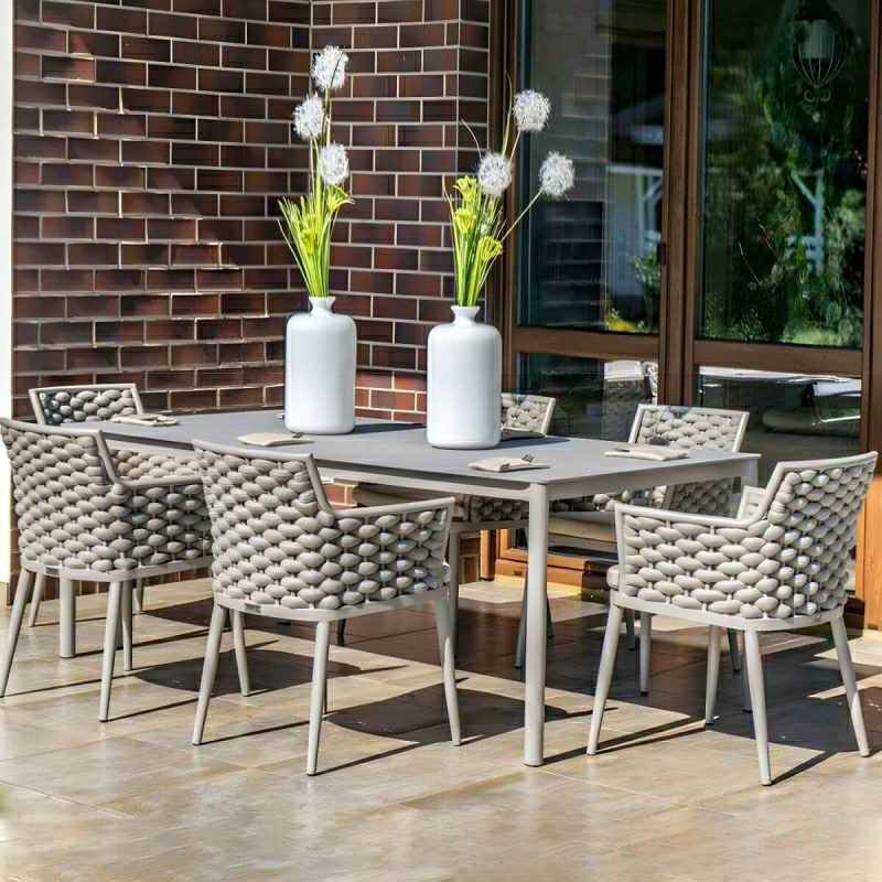 "Modern Grey Stone Patio Dining Table with Waterproof Durability and Umbrella Hole - 70.9"L x 35.4"W x 29.5"H Table Only"