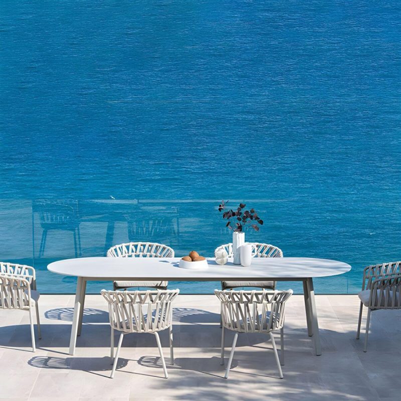 "Contemporary Style Stone Patio Table Oval Shape with Metal Legs in Grey/White - Table Only 63"L x 31.5"W x 29.5"H Gray"