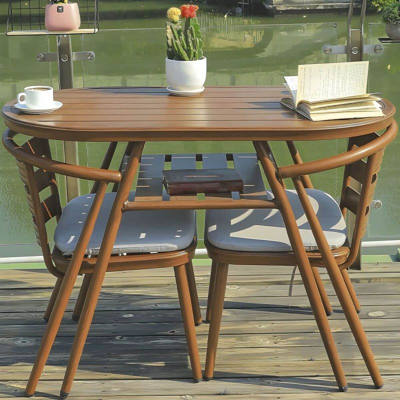 "Oval Metal Patio Table Contemporary Style Water Resistant in Brown - 31"L x 24"W x 29"H"