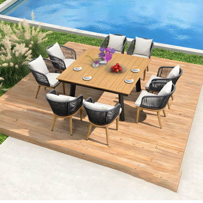 "Modern Black Patio Dining Set: Metal Frame, Upholstered White Cushions, Leaf Not Included - 2 Tables & 12 Chairs 61"L x 39"W x 30"H"