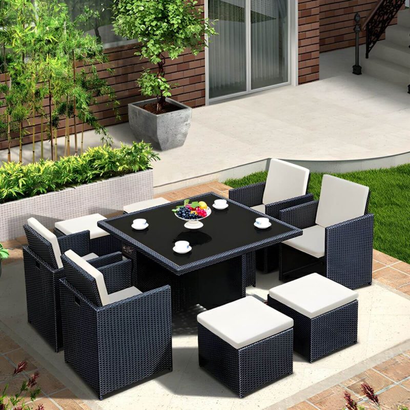 "Stylish Weatherproof Glass-top Patio Dining Set with Upholstered Chairs - Table & Chair(s) 47.2"L x 23.6"W x 28.7"H 2 Black"
