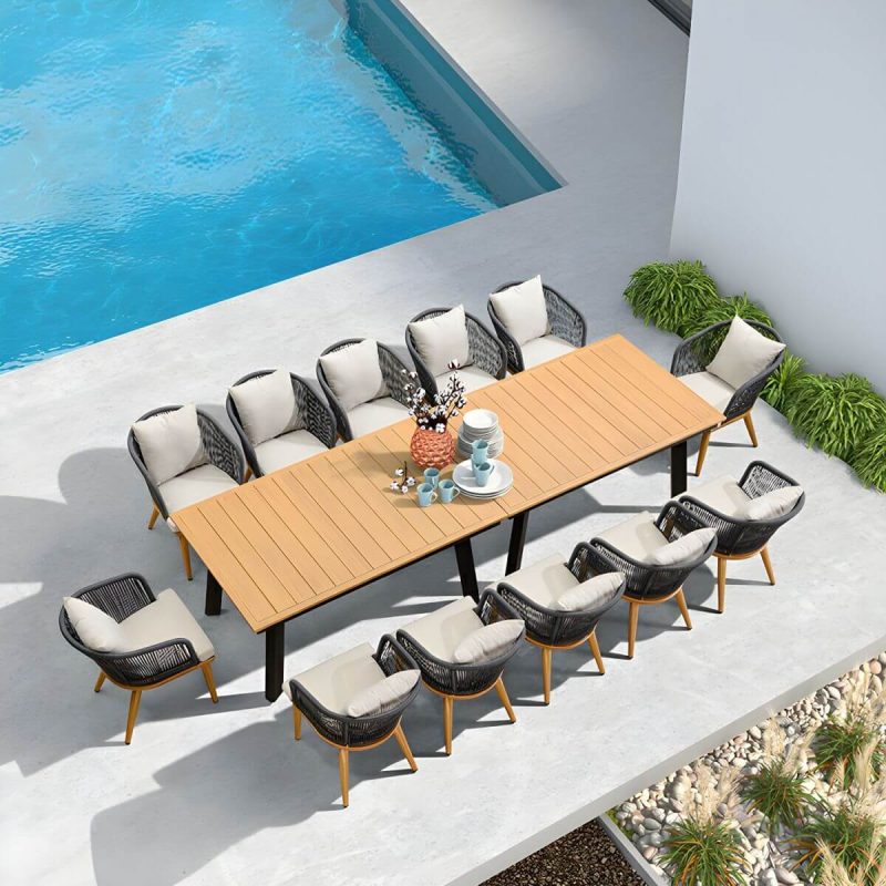 "Modern Black Patio Dining Set: Metal Frame, Upholstered White Cushions, Leaf Not Included - Table & 6 Chairs 61"L x 39"W x 30"H"