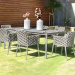 "Modern Grey Stone Patio Dining Table with Waterproof Durability and Umbrella Hole - 94.5"L x 35.4"W x 29.5"H Table Only"