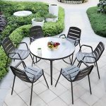"Modern Black Metal Arm Chair with Stackable Design and Waterproof Durability - 8 Piece Set"