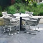 "Stone Patio Dining Table Set Metal Black Legs with Gray Cushion and Woven Chair Back - Table 19.7"L x 19.7"W x 23.5"H"
